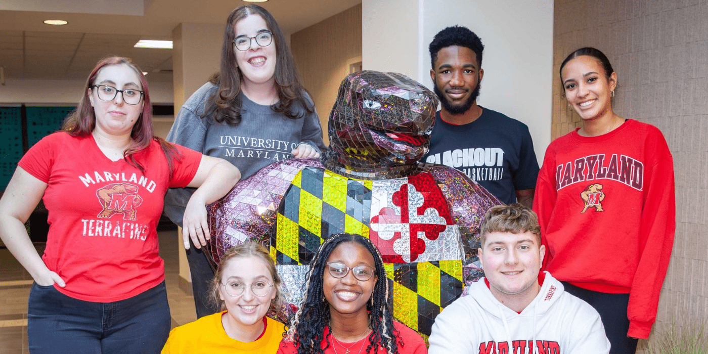 group of students posing with Testudo