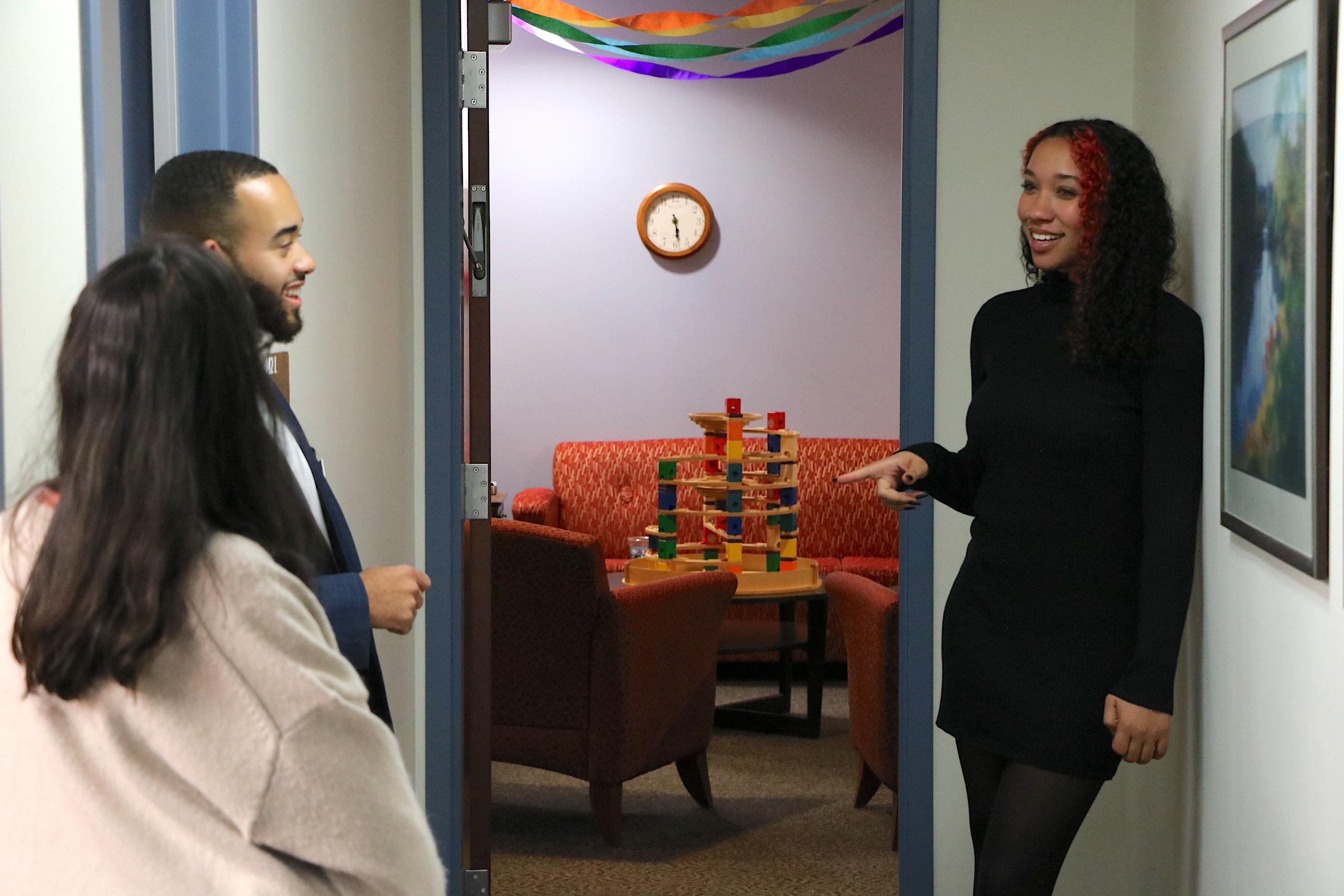 Clinical interns standing the hallway of the Center for Healthy Families
