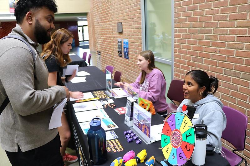 Students interact at student involvement fair