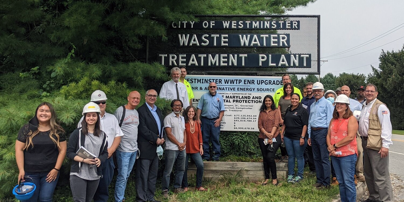 University of Maryland environmental health scientists pose at the Westminster Waste Water Treatment Plant