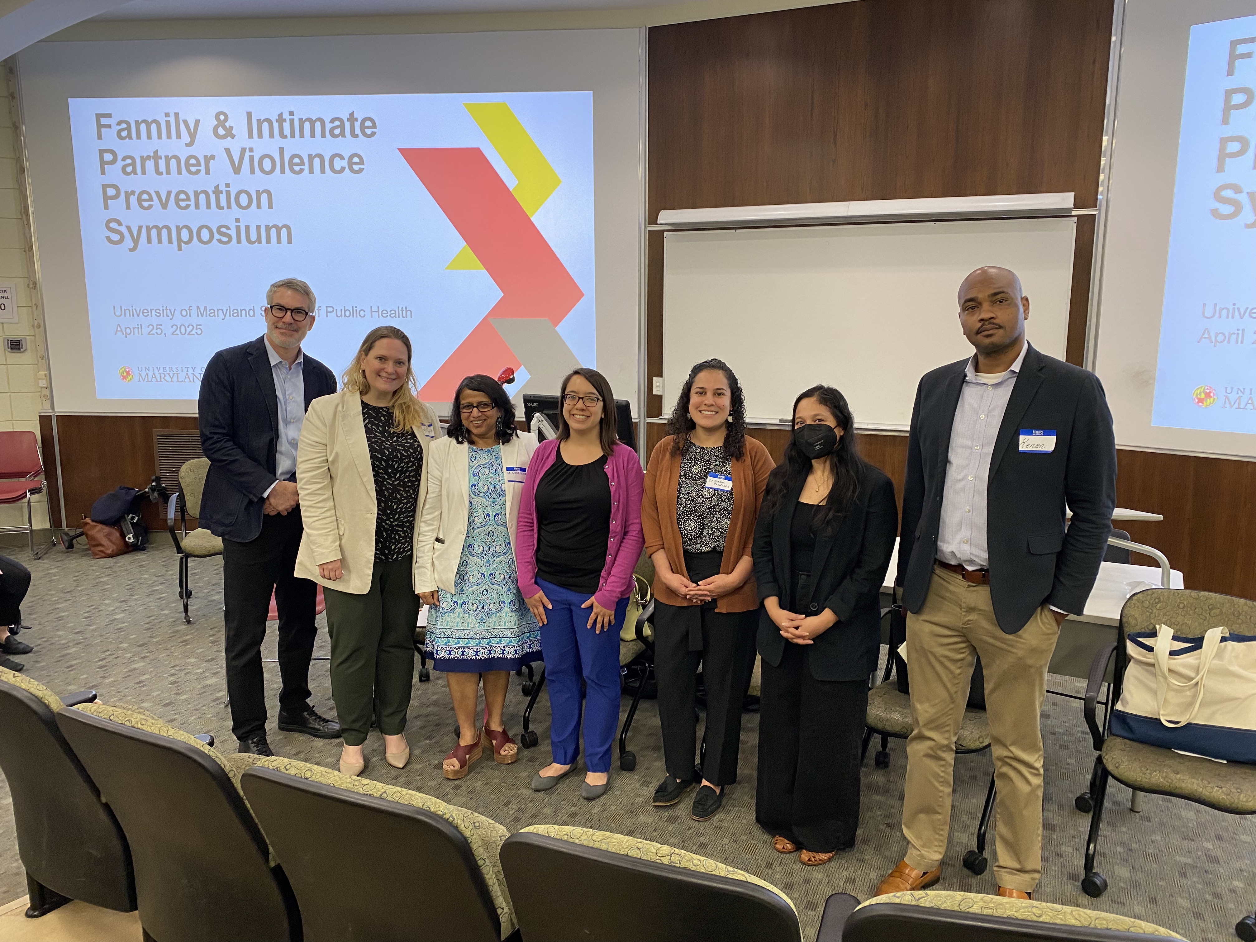 Panelists pose for a photo at first symposium on violence prevention