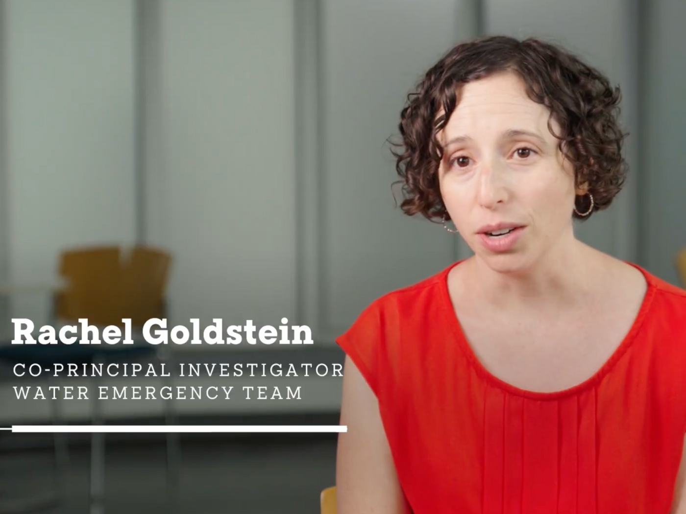 Professor Rachel Goldstein talks to the camera in a video still with her name and title on screen