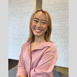 woman in a blush toned shirt