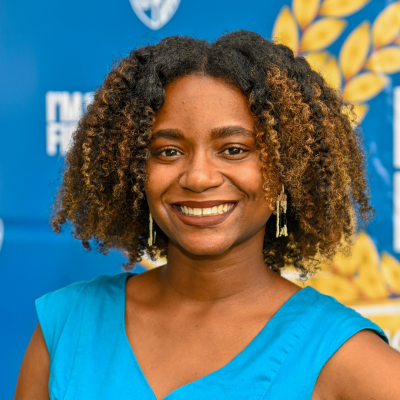 Black woman with blue blouse on