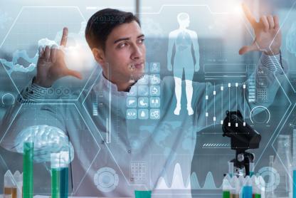Laboratory researcher examines a digital display with a human figure and molecular graphics.