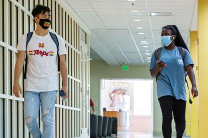 Students hanging out in Stamp Student Union wearing Terrapin Strong masks, practicing the 4Maryland guidelines.