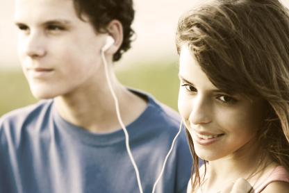2 students listening to music 