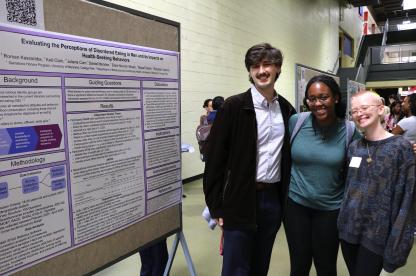 Three students presenting at SPH's Research and Practice Day