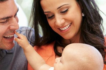 two parents with their baby