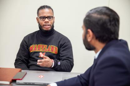 graduate student speaking with professor