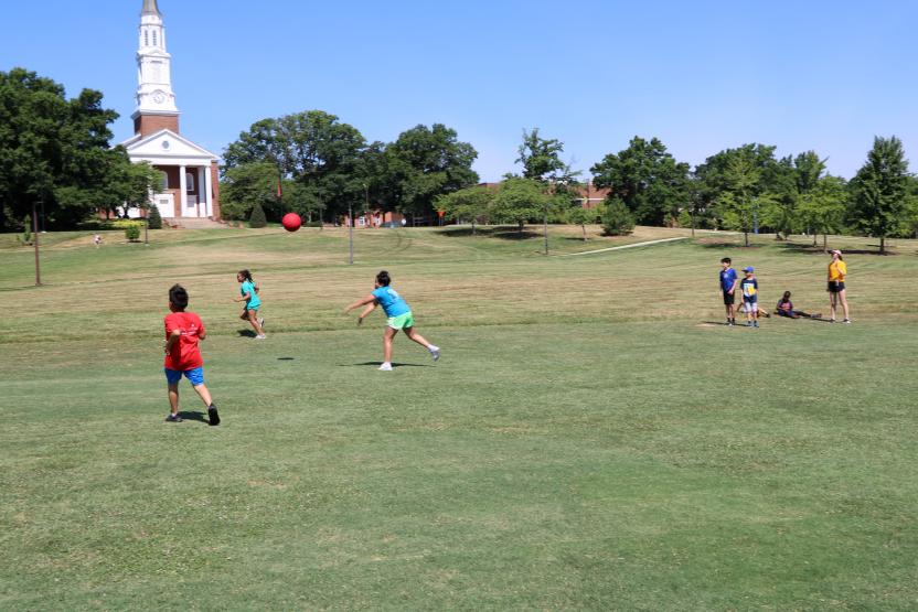 Kids playing kickball