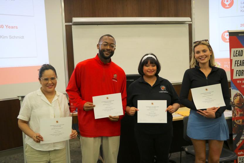 group photo of faculty members winning an award