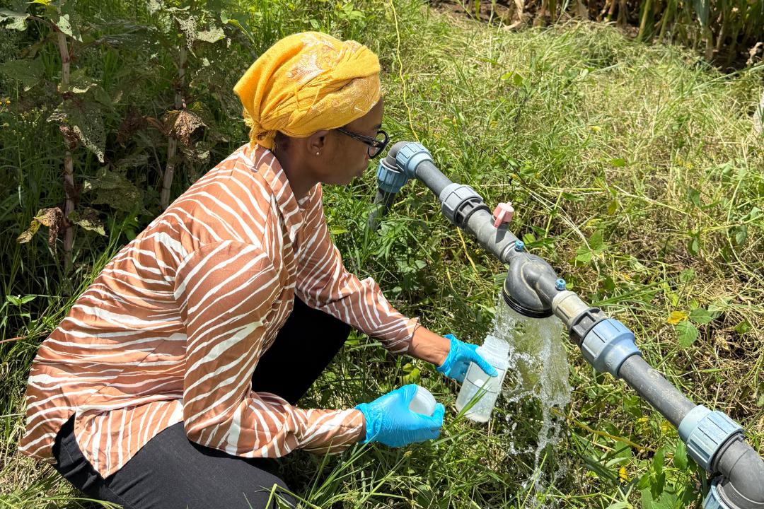 student tests water in tanzania