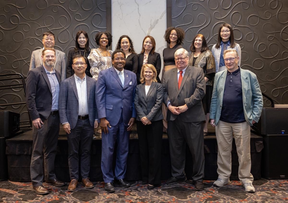 Faculty and leadership pose for a photo