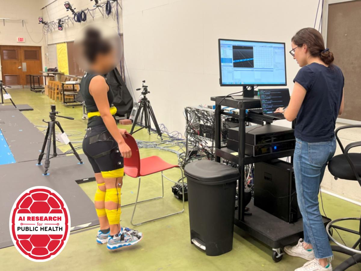 researcher on computer and participant with device on