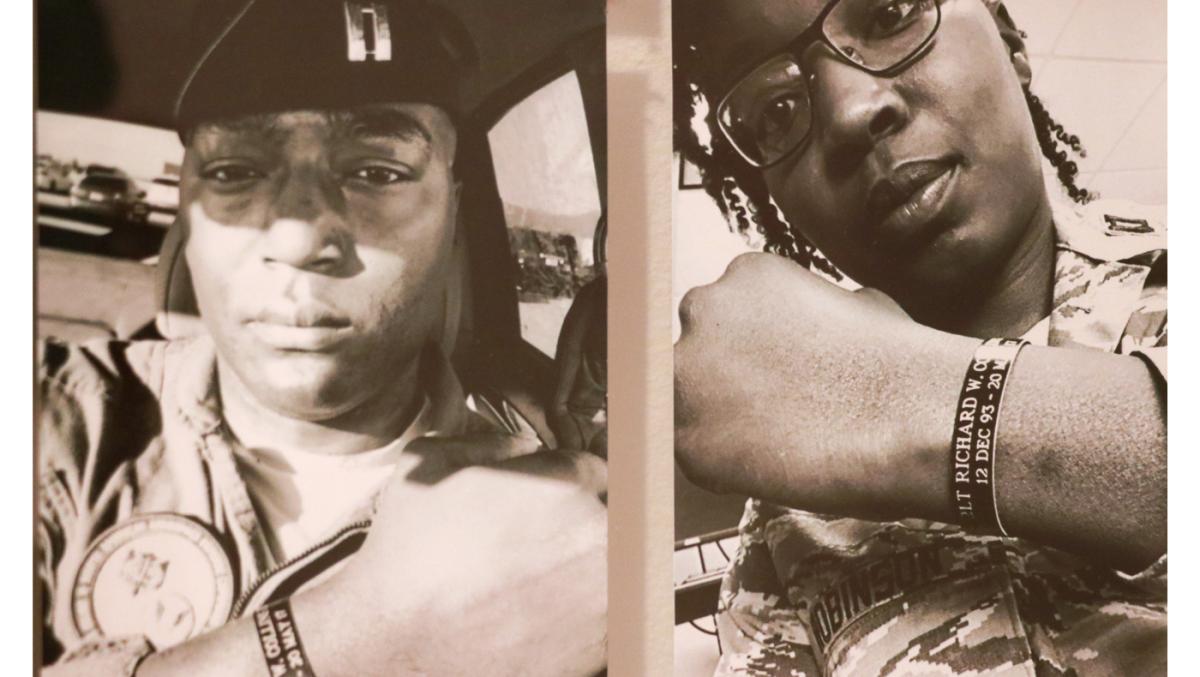 Two Black members of the military show their wristbands in these two B+W photos