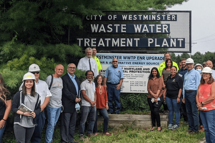 University of Maryland environmental health scientists pose at the Westminster Waste Water Treatment Plant