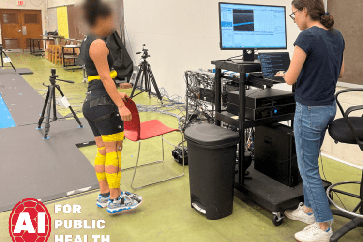 study participant tests a wearable device with researcher