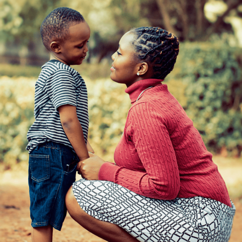 Black mother and child looking at each other