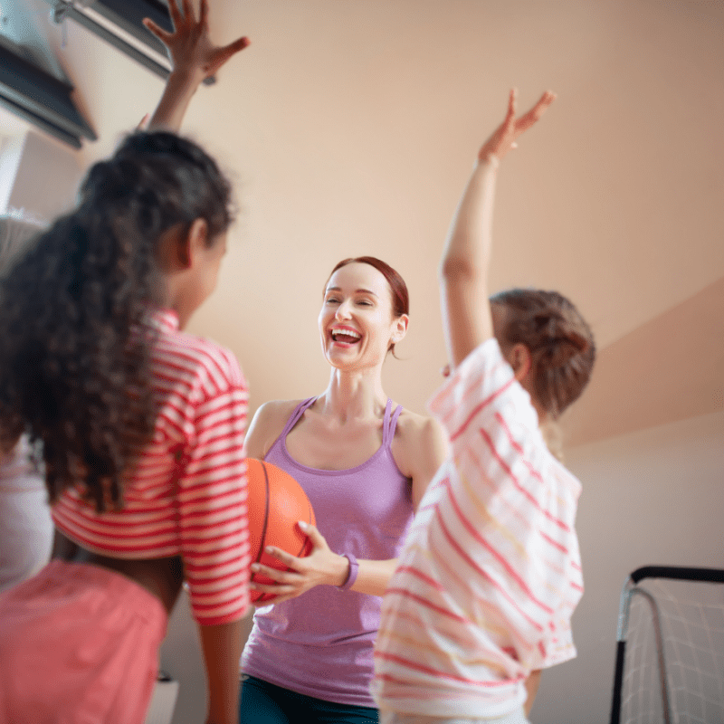 Physical education teacher with children