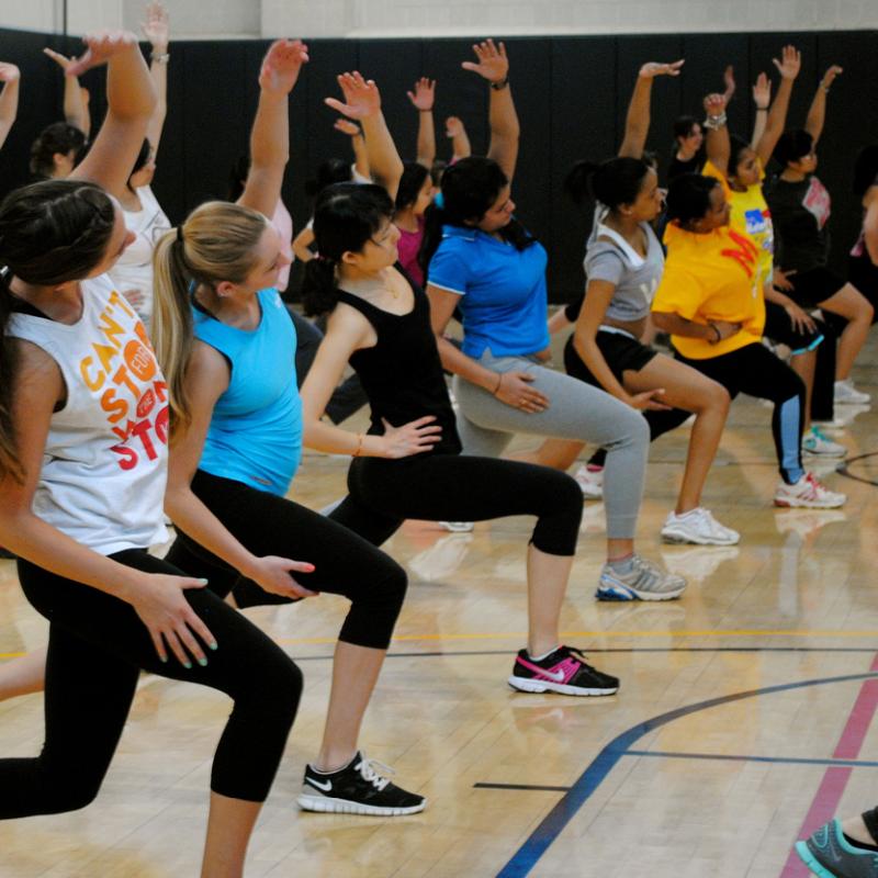 Group of people doing stretching exercises