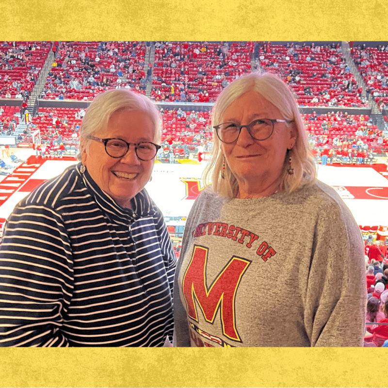 Drs Clark and Whitall at UMD basketball game