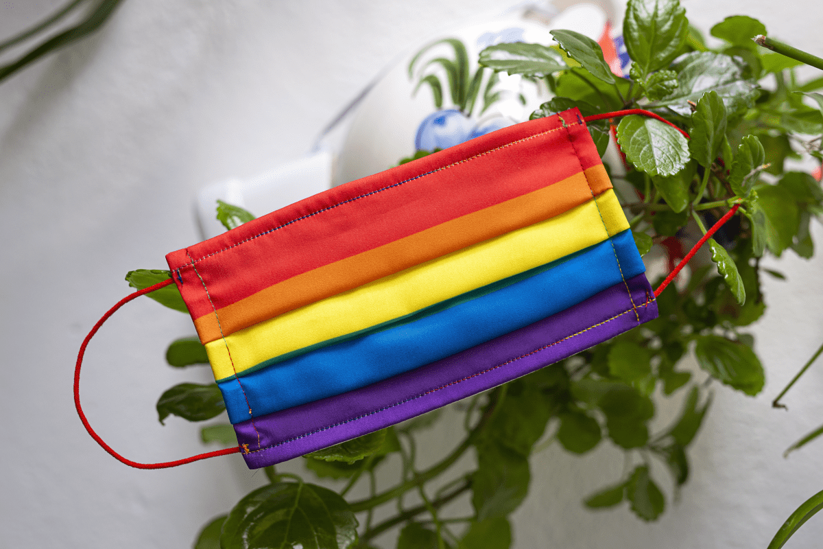 Covid-19 mask with the LGBTQ+ flag colors