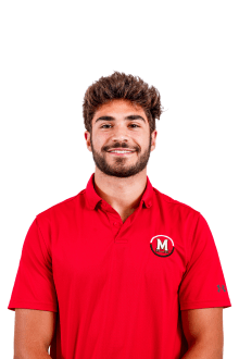 Man with red shirt, beard, and white background