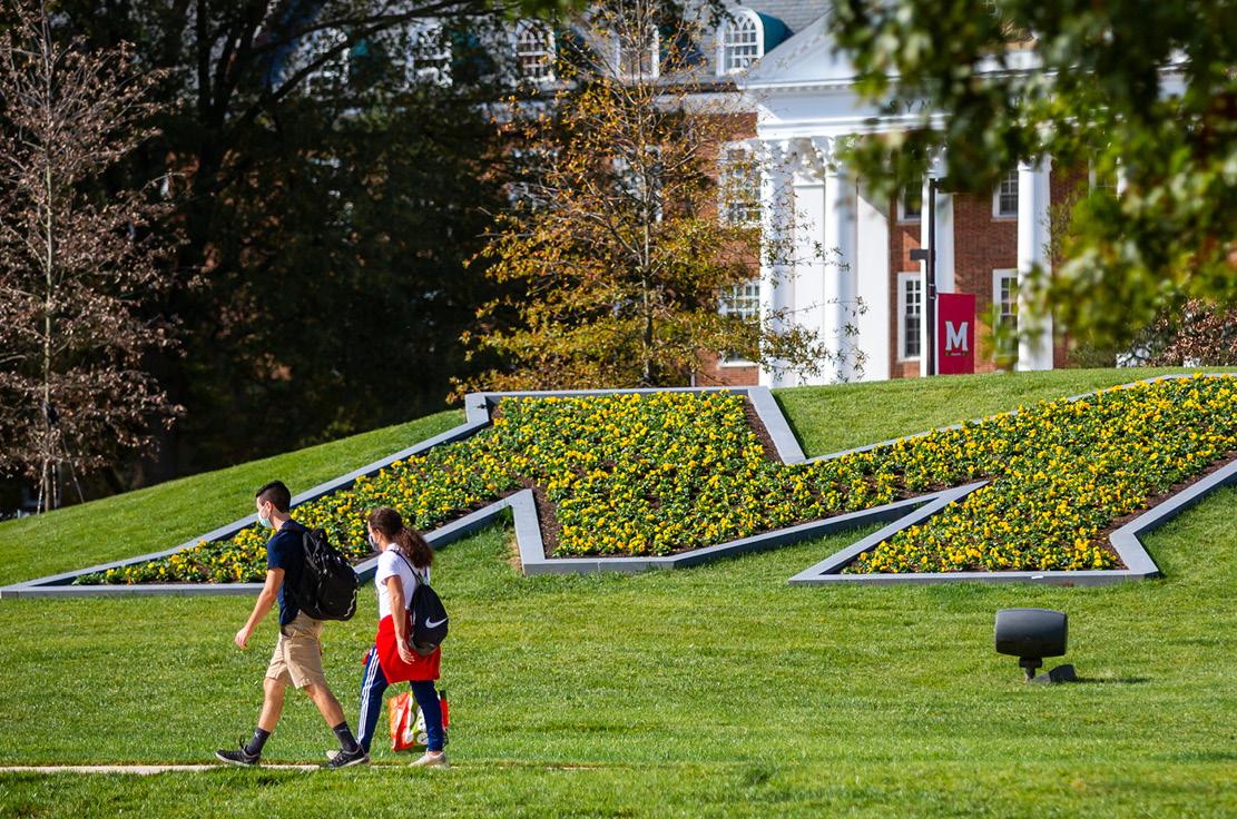 Students walking by The M Circle at the University of Maryland 