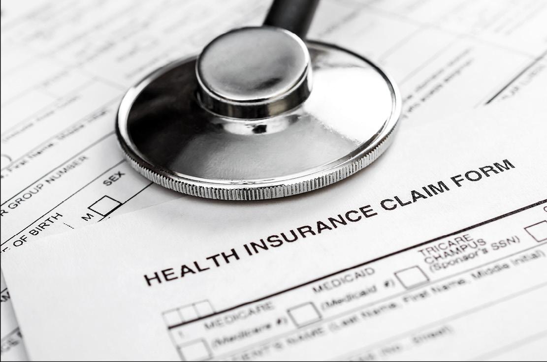 Stethoscope on health insurance claim form