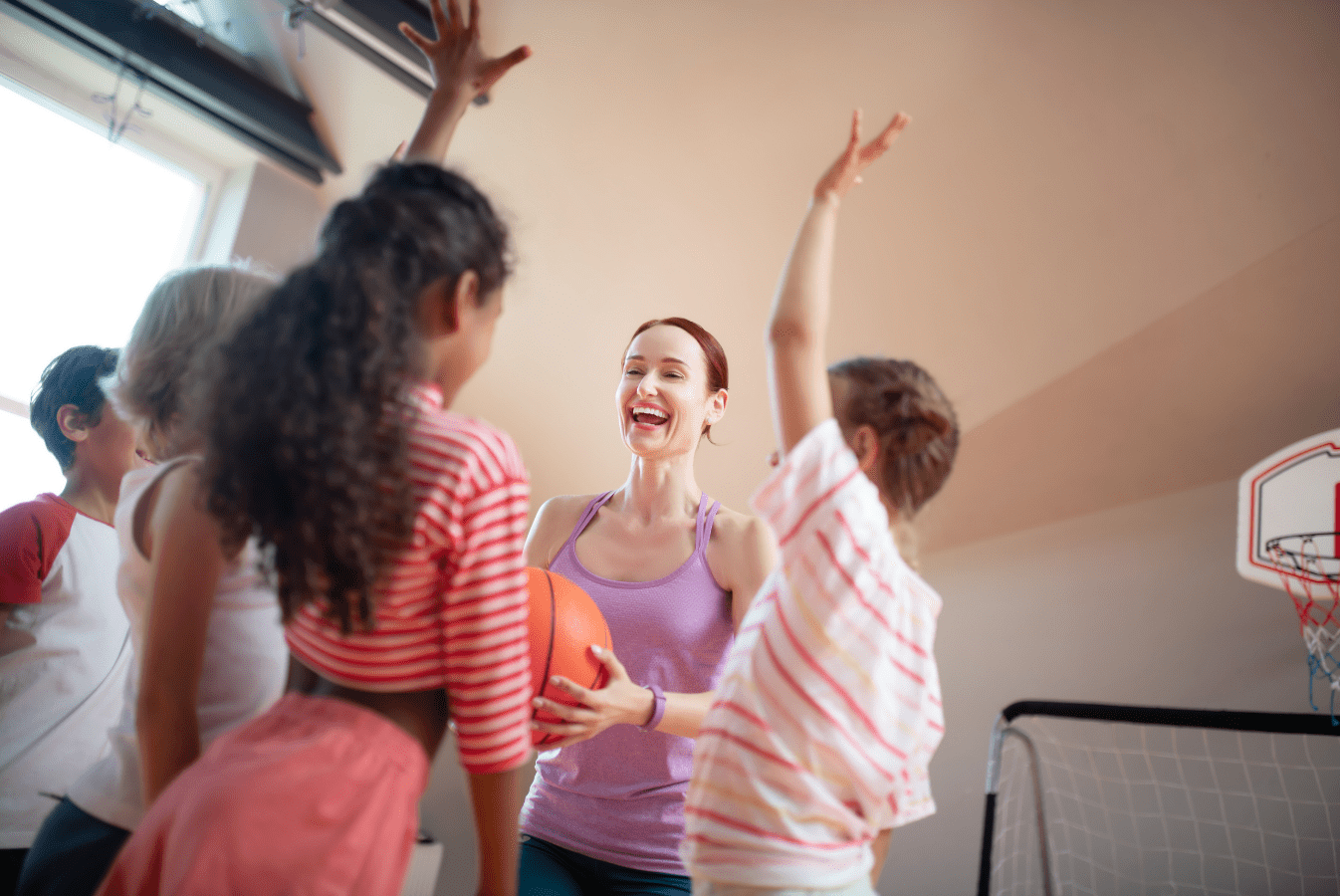 Physical education teacher with children