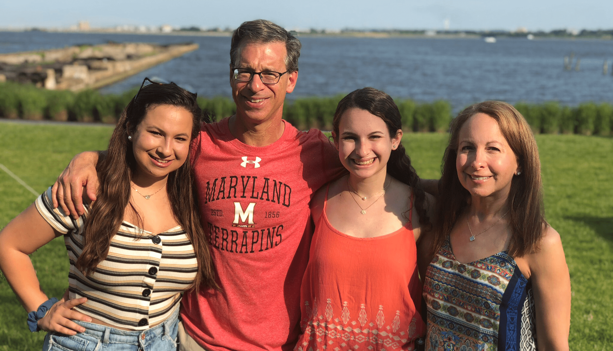 The Cohen-Schwartz family looking at camera smiling