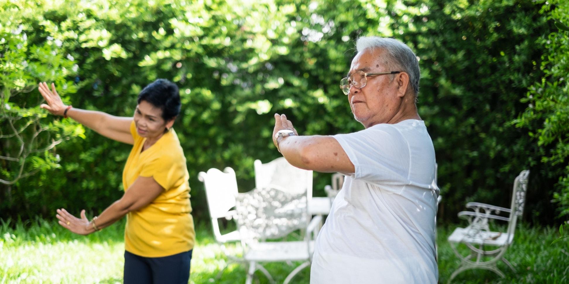 Asian old senior workout exercise and doing yoga at home