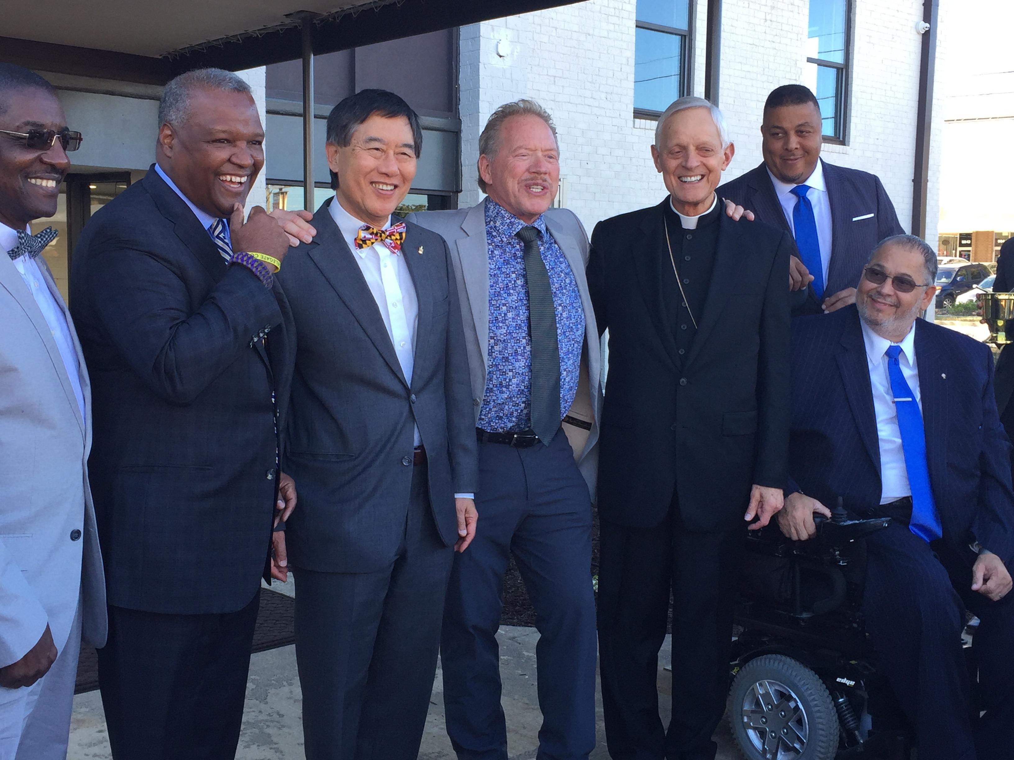 President Loh of the University of Maryland and a group of men