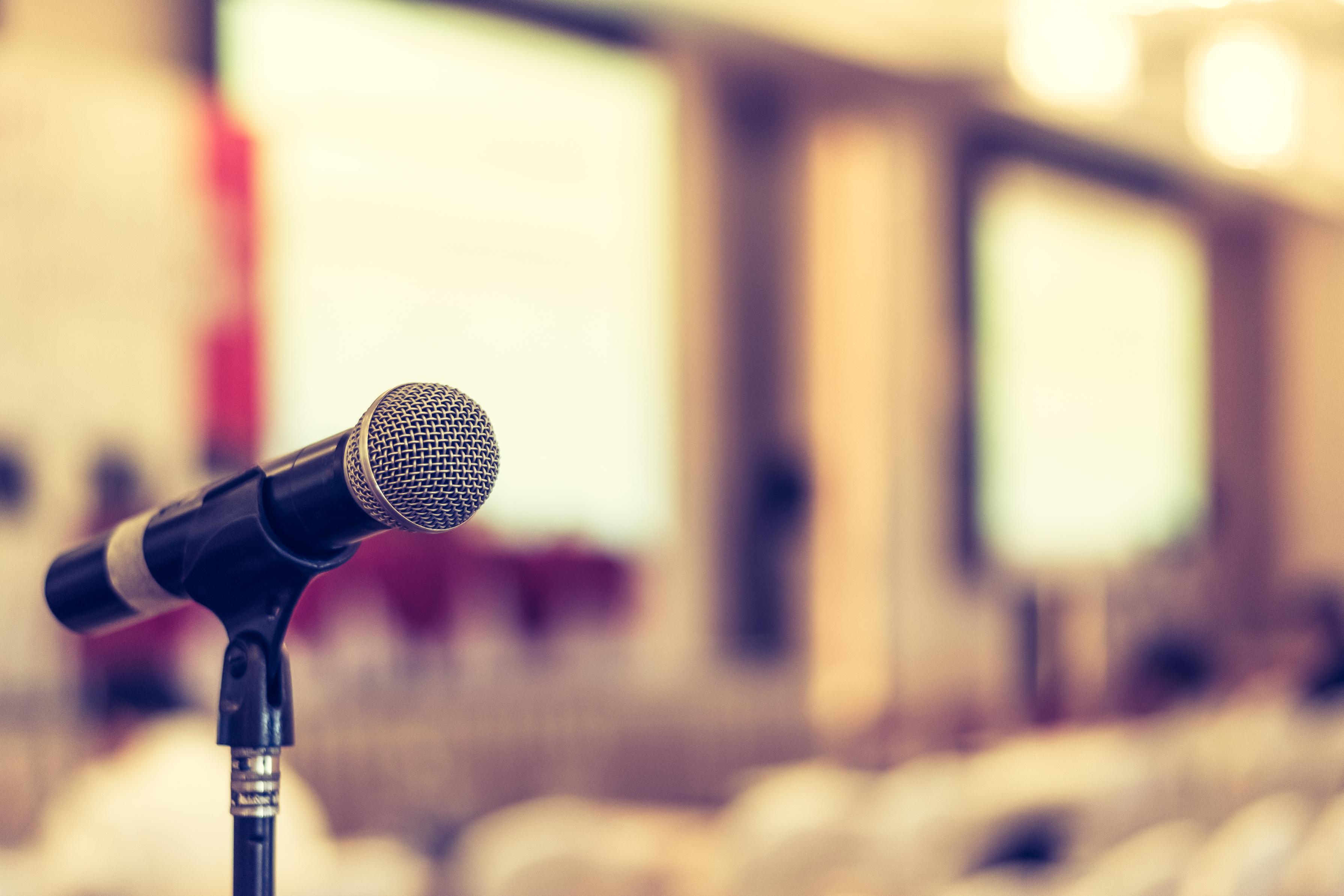 Guest speaker microphone with a blurry background