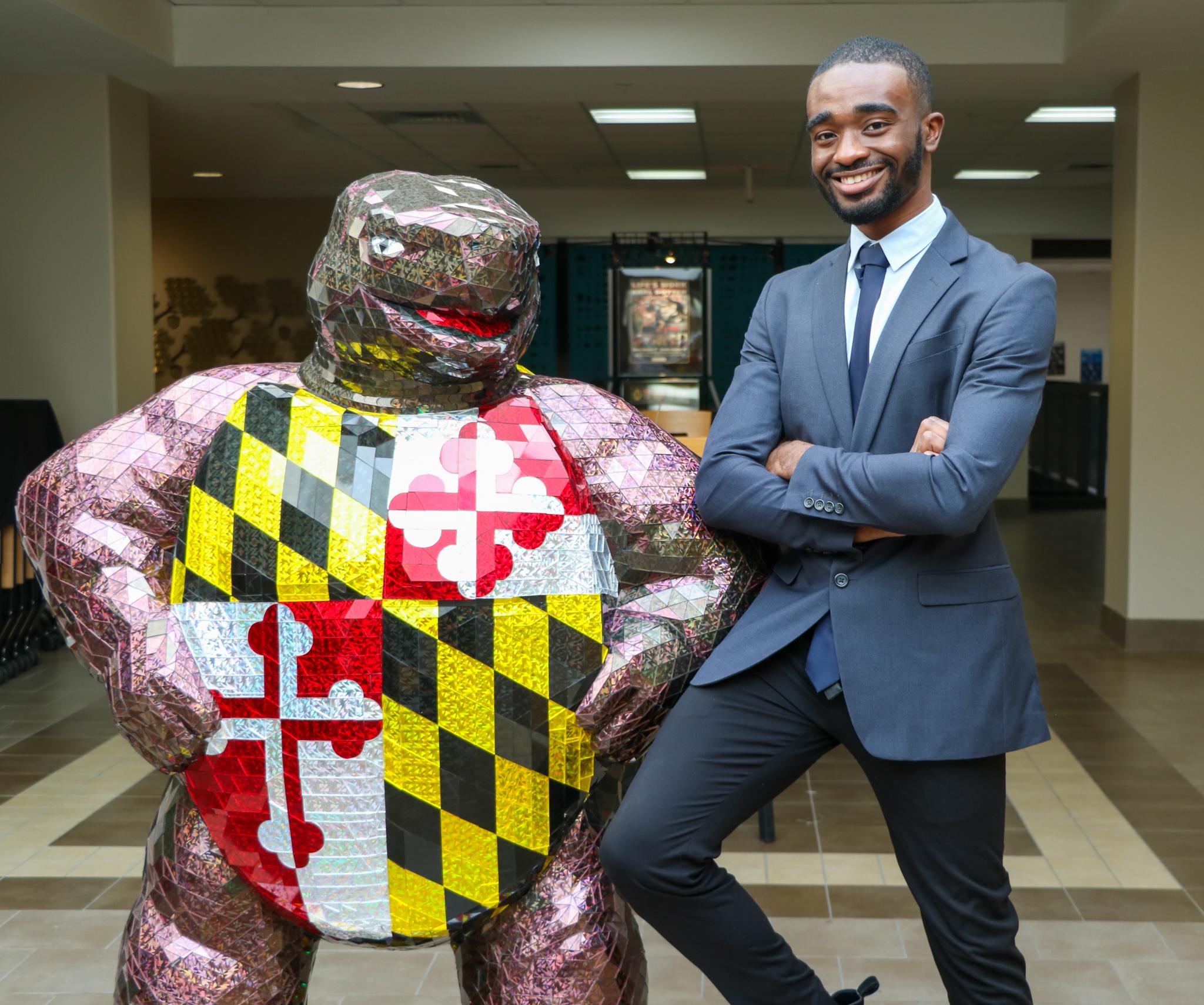 Ike Ekwunife posing with the SPH terrapin 