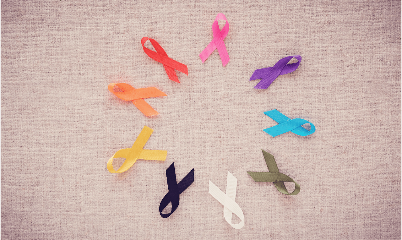 Circle of colorful ribbons for cancer awareness