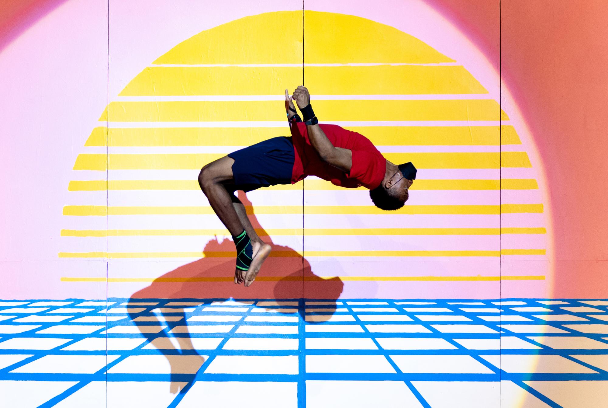 Gymkana troupe member making a flip