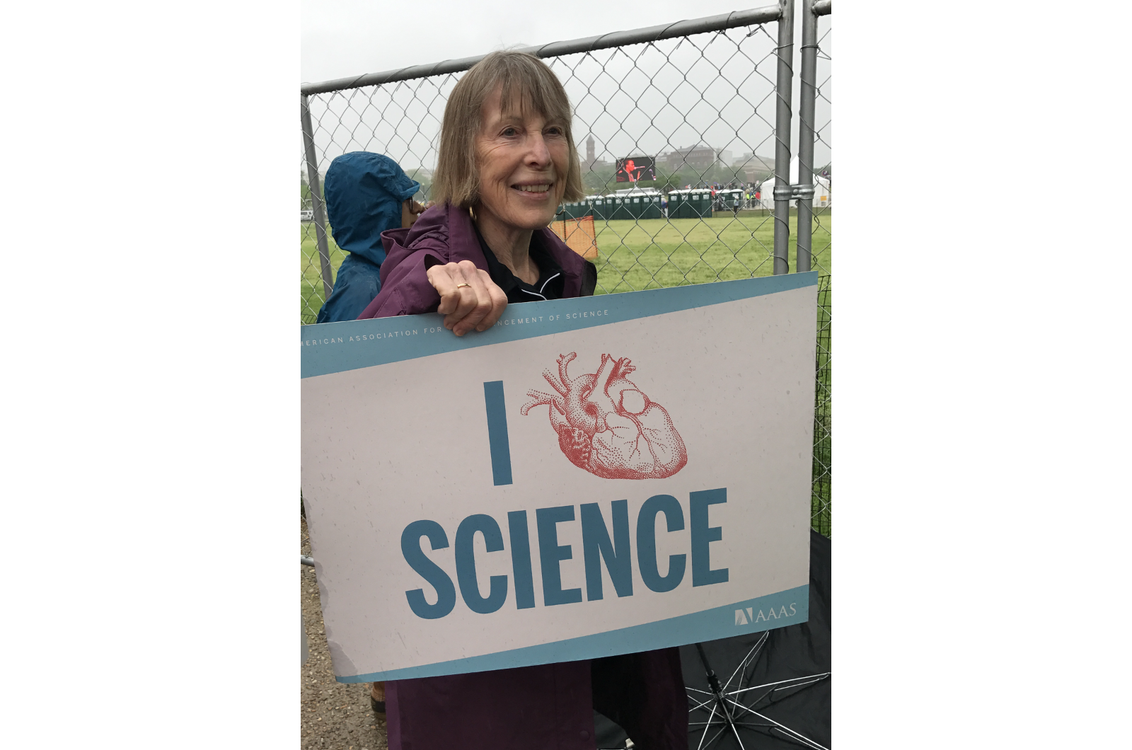 Alice Horowitz holds "I heart Science" sign 
