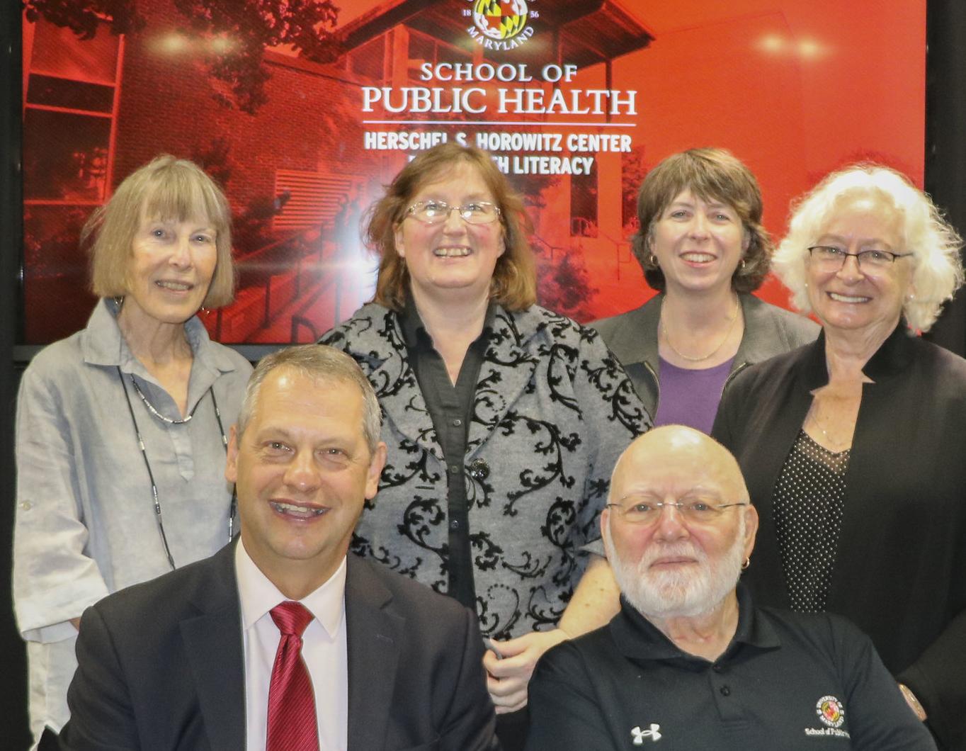 Alice Horowitz (left) celebrates the tenth anniversary of the Horowitz Center for Health Literacy with invited guests, Dean Luhsniak and founding Dean Bob Gold