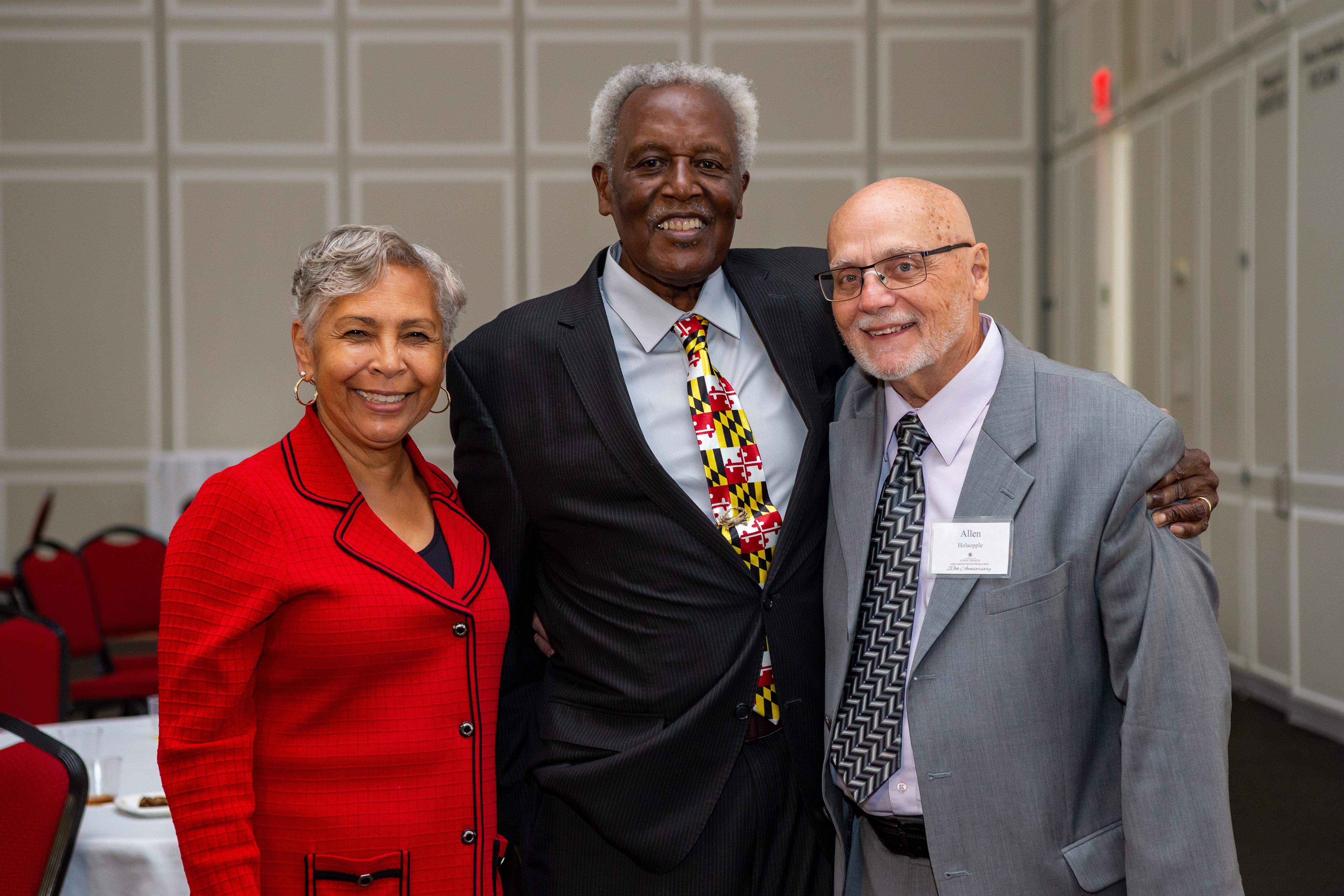 Renee Smoot, an LLIPP alumna, Wesley Queen and a man wearing glasses celebrate the 20th anniversary of the Legacy Leadership Institute for Public Policy 
