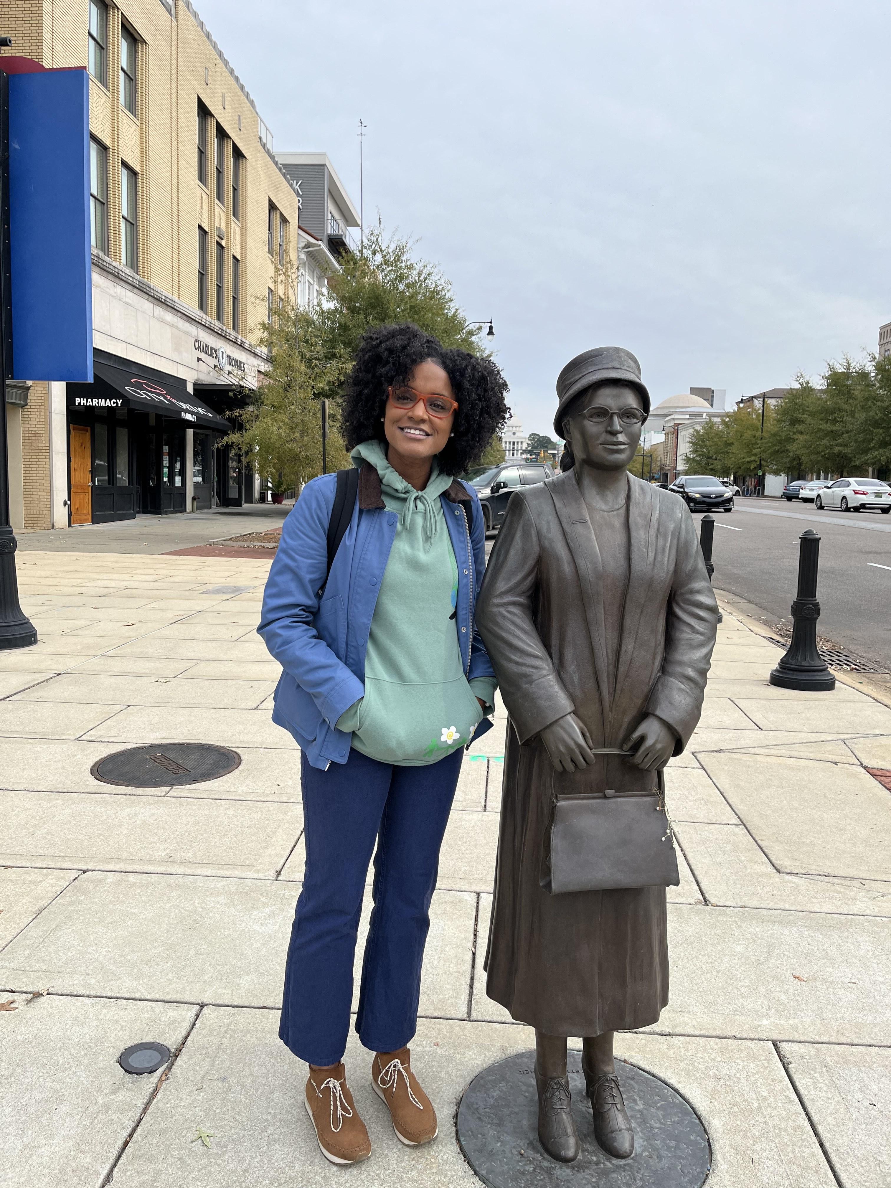 Associate Professor Jennifer D. Roberts with statue of Rosa Parks in Montgomery, Alabama (November 19, 2022). Photo by AJ.