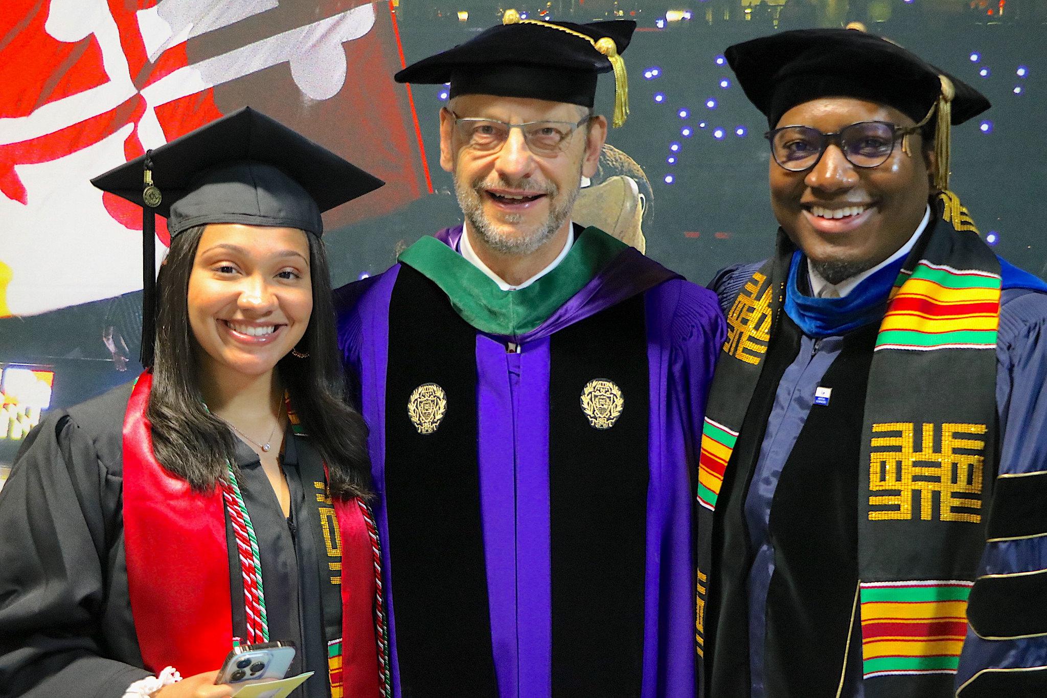 Taliah Hodges, Dean Boris Lushniak and Christopher Upperman at the 2023 UMD School of Public Health commencement ceremony 