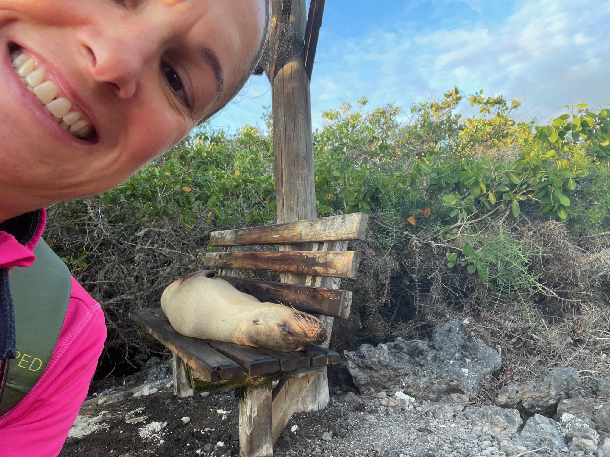 Jennifer Reed with sea lion in the Galápagos Islands