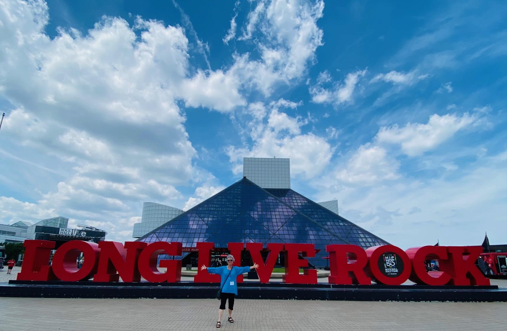 Retired Chair Sandra Crouse Quinn in front of Rock & Roll Hall of Fame