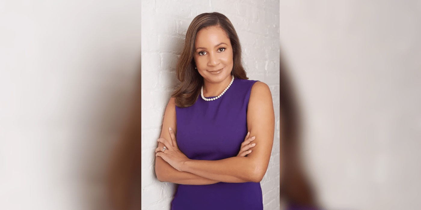 Woman in purple business dress