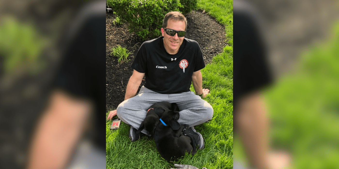 Man sitting with dog