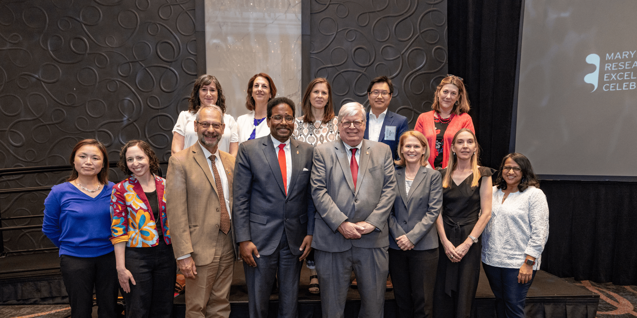 group photo of SPH faculty with UMD leaders