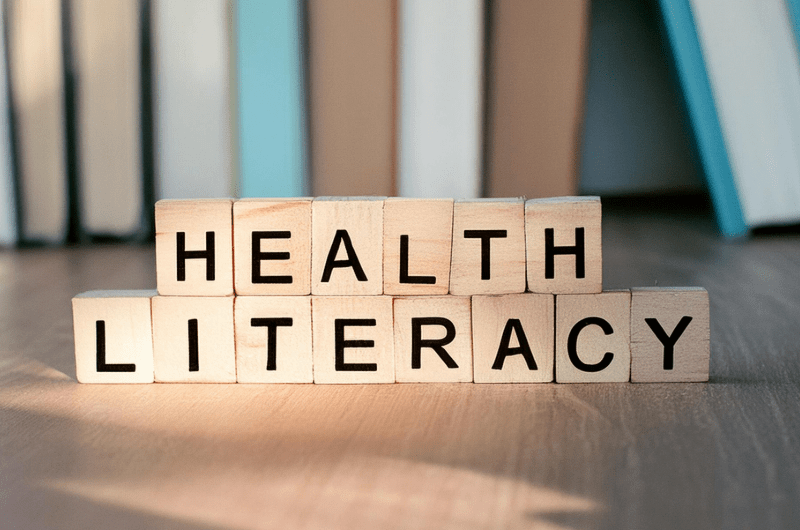 Wooden blocks spelling out the words "health literacy"