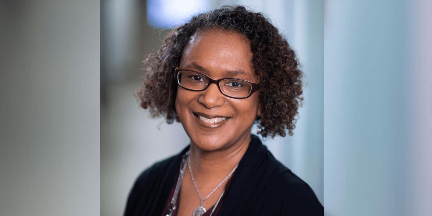 Professor Devon Payne-sturges, a black woman smiles at camera